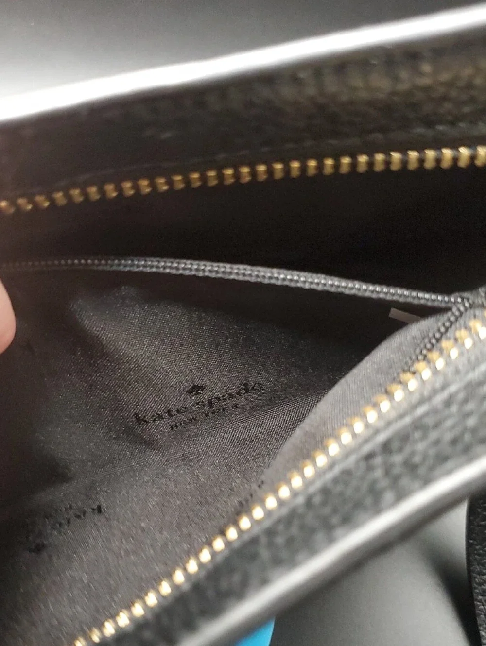 Kate Spade black pebbled leather shoulder bag with gold logo
